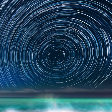 Star-trails above the sea clipart