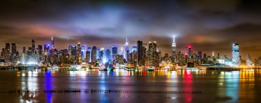 New York City Panorama on a cloudy night clipart