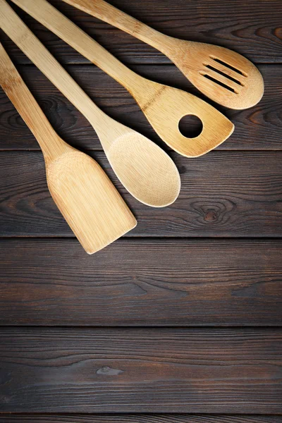 Wooden kitchenware on wooden background — Stock Photo, Image