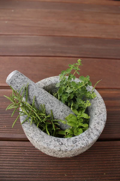 herbs in a stone mortar