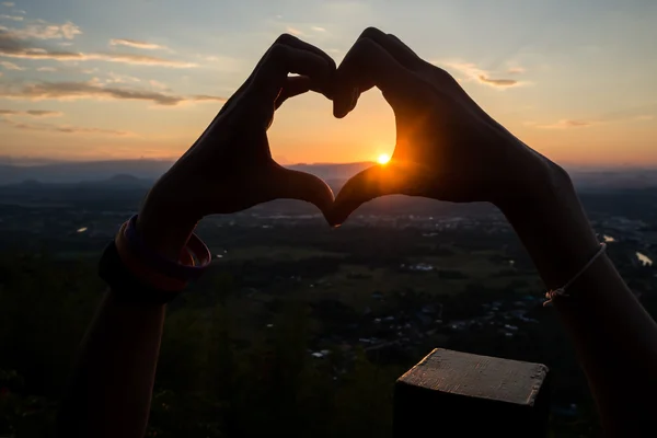 Makes heart symbol by hand — Stock Photo, Image