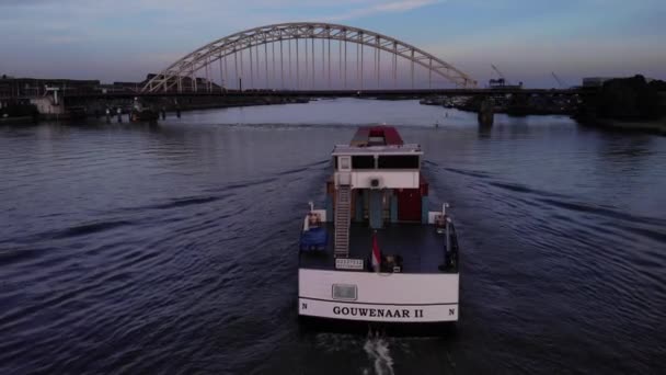 Aerial Tracking Shot Hybrid Barge Container Vessel Gouwenaar Passing Bridge — Stock Video