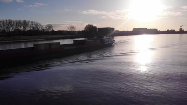 Sulomaro Inland Container Ship Sailing Quiet River Backlit Sunlight South — Stock Video