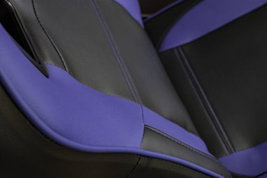 Siyah ve mor deri döşeme. Oyun masası koltuğu dikişleri.