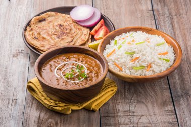 Dal Makhani or daal makhni or Daal makhani, indian lunch/dinner item served with plain rice and butter Roti, Chapati, Paratha and salad clipart