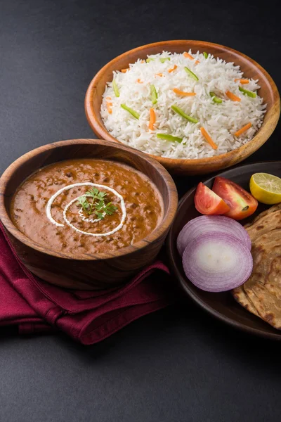 Dal Makhani or daal makhni or Daal makhani, indian lunch/dinner item served with plain rice and butter Roti, Chapati, Paratha and salad — Stock Photo, Image