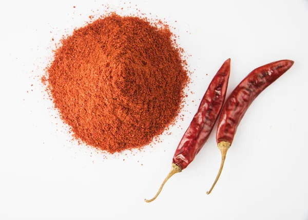Red chilli powder with red dried chillies — Stock Photo, Image