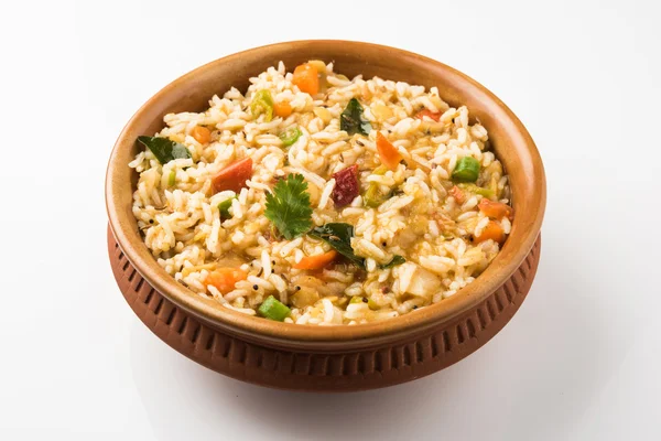 Sambar rice / rice sambar / sambar mixed with rice, tasty south indian dish served in a terracotta bowl, isolated — Stock Photo, Image