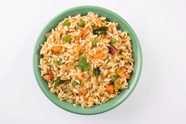 Sambar rice / rice sambar / sambar mixed with rice, tasty south indian dish served in a terracotta bowl, isolated — Stock Photo, Image