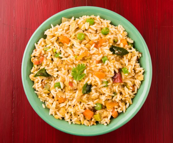 Sambar rice / rice sambar / sambar mixed with rice, tasty south indian dish served in a terracotta bowl, isolated — Stock Photo, Image