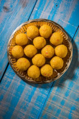 indian sweets bundi laddu or motichur laddu or motichoor laddu, selective focus clipart
