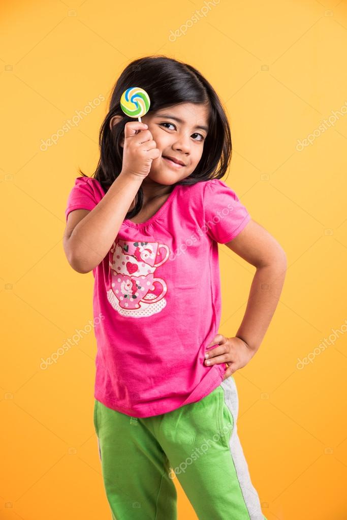 Indian Small Girl Hairstyle Indian Small Girl With Lolipop Or