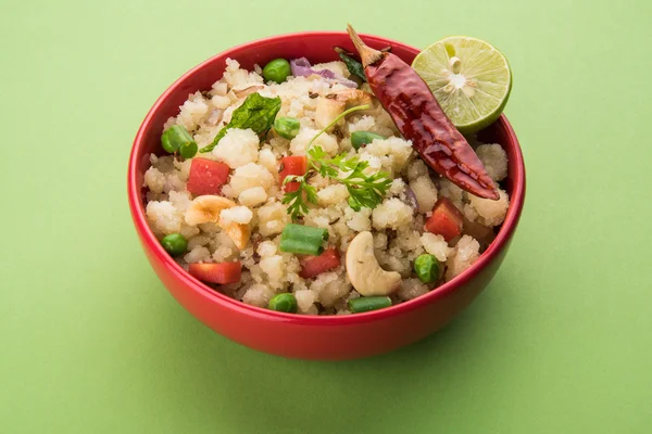 Upma or upama or uppuma, favourite south indian sweet and salty breakfast menu or snacks — Stock Photo, Image