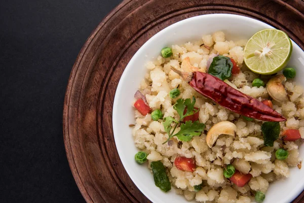 Upma or upama or uppuma, favourite south indian sweet and salty breakfast menu or snacks — Stock Photo, Image