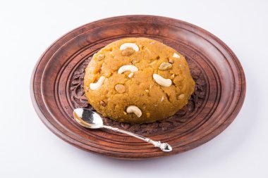 Moong Dal Halwa - a sweet dish from India, Indan Sweet Halwa made from Moong Dal, moong dal sweet sheera or shira cooked in pure ghee clipart