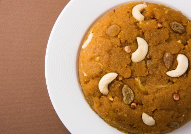 Moong Dal Halwa - a sweet dish from India, Indan Sweet Halwa made from Moong Dal, moong dal sweet sheera or shira cooked in pure ghee clipart