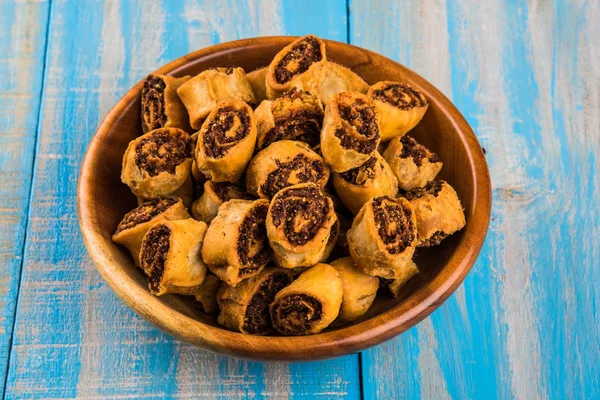 Indian spicy sweet fried snack also known as bakarwadi or bakarvadi or bakar vadi or bakar wadi or spring roll, favourite snacks with tea,  favourite snacks item originated in pune, maharashtra — Stock Photo, Image