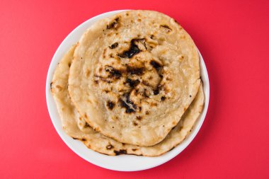 tereyağı roti, chapati, naan, kulcha, paratha, tanduri roti olarak da bilinen hint özel ekmek