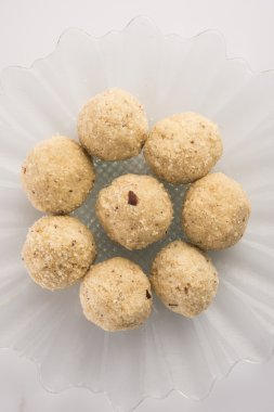 indian sweet coconut laddu or nariyal laddoo, selective focus clipart
