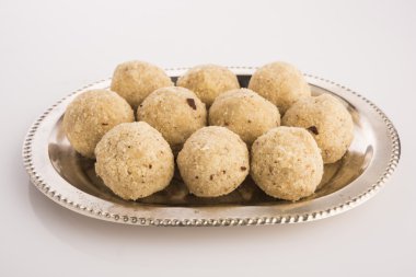 hintçe birçok hindistan cevizi tatlı laddu veya nariyal laddoo , closeup