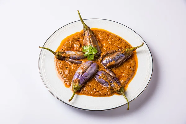 Egg plant south indian curry, brinjal curry, brinjal masala also known as baigan masala or baingan masala in India, spicy and tasty dish served with chapati, main course — Stock Photo, Image