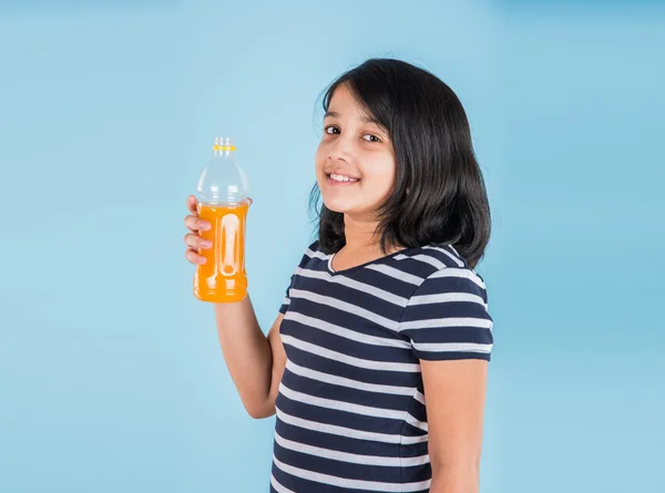 indian girl with cold drink bottle, asian girl drinking cold drink in pet bottle, girl kid and cold drink, indian cute girl with mango or orange cold drink in plastic bottle, isolated