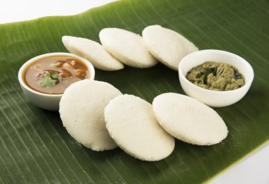 Idly with sambar Iddli is a traditional breakfast of South Indian clipart