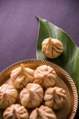Indian sweet food called Modak, favourite of Lord Ganesha clipart