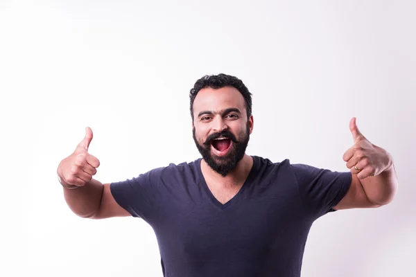 Jovem indiano hipster com barba e bigode mostrando sinal de sucesso ou polegares para cima com ambas as mãos, isolado sobre fundo branco — Fotografia de Stock