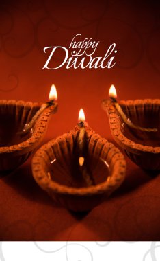mutlu bayramlar veya mutlu deepavali tebrik kartı diya veya yağ lambası bir fotoğrafını kullanılarak yapılan