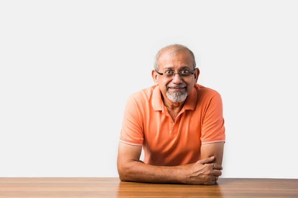 Portrait Indian Asian Senior Man Sit Table Presenting Success Pose — Stok Foto