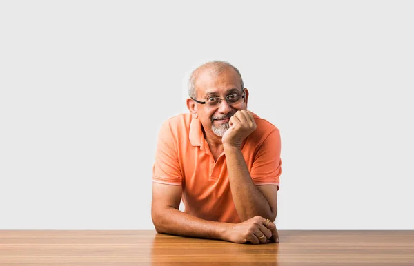 Portrait Indian Asian Senior Man Sit Table Presenting Success Pose — Stok Foto