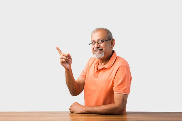 Portrait Indian Asian Senior Man Sit Table Presenting Success Pose — Stok Foto
