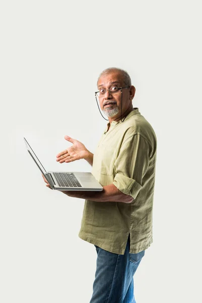 Indian Asian Senior Adult Man Grandpa Using Laptop Holding Paper — Stock Photo, Image
