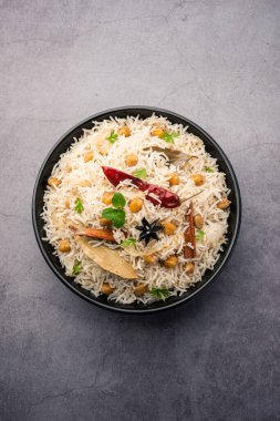 Lezzetli Baharatlı Chana Pulao veya Pulav veya pilav Basmati Rice ve nohut ile pişirilmiş baharatlı siyah veya beyaz nohut