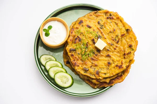 Maharashtrian Kakdi Thalipeeth or Punjabi cucumber paratha, made from fresh grated kheera for breakfast and serve it along with yogurt