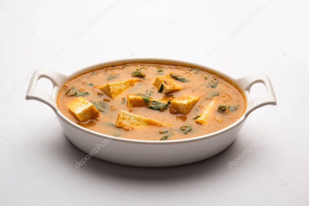 Methi Paneer Sabzi or Indian Style Cottage Cheese with fenugreek leaves curry recipe. Served in a bowl or Karahi. selective focus