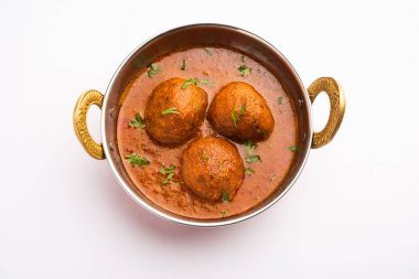 Malai Kofta Curry, soğanlı domates soslu patates peyniriyle kızartılmış Hint mutfağı.