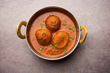 Malai Kofta Curry, soğanlı domates soslu patates peyniriyle kızartılmış Hint mutfağı.