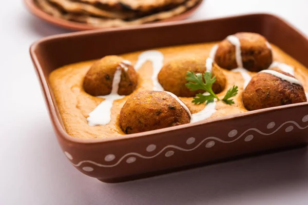 Malai Kofta Curry is an indian cuisine dish with potato cottage cheese fried balls in onion tomato gravy with spices