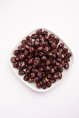 Hint jübbesi, dut ya da beresi tatlı ve ekşi tadı olan jaggery şurubunda kaynatılmış Labdo, tipik yol kenarı atıştırmalıkları.