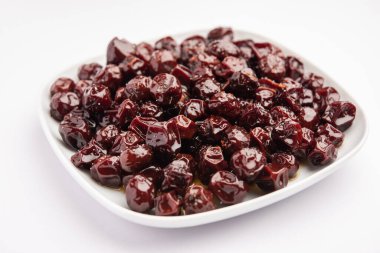 Hint jübbesi, dut ya da beresi tatlı ve ekşi tadı olan jaggery şurubunda kaynatılmış Labdo, tipik yol kenarı atıştırmalıkları.