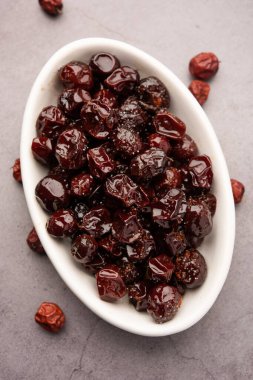 Hint jübbesi, dut ya da beresi tatlı ve ekşi tadı olan jaggery şurubunda kaynatılmış Labdo, tipik yol kenarı atıştırmalıkları.