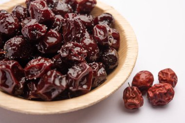 Hint jübbesi, dut ya da beresi tatlı ve ekşi tadı olan jaggery şurubunda kaynatılmış Labdo, tipik yol kenarı atıştırmalıkları.