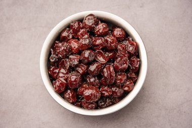 Hint jübbesi, dut ya da beresi tatlı ve ekşi tadı olan jaggery şurubunda kaynatılmış Labdo, tipik yol kenarı atıştırmalıkları.