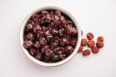 Hint jübbesi, dut ya da beresi tatlı ve ekşi tadı olan jaggery şurubunda kaynatılmış Labdo, tipik yol kenarı atıştırmalıkları.