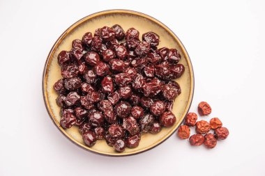 Hint jübbesi, dut ya da beresi tatlı ve ekşi tadı olan jaggery şurubunda kaynatılmış Labdo, tipik yol kenarı atıştırmalıkları.