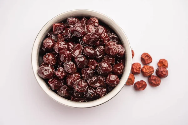 Hint jübbesi, dut ya da beresi tatlı ve ekşi tadı olan jaggery şurubunda kaynatılmış Labdo, tipik yol kenarı atıştırmalıkları.