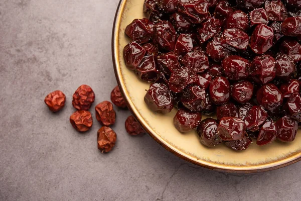 Hint jübbesi, dut ya da beresi tatlı ve ekşi tadı olan jaggery şurubunda kaynatılmış Labdo, tipik yol kenarı atıştırmalıkları.