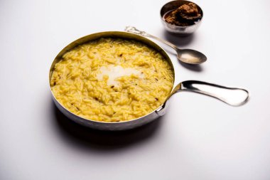 Dal Khichdi Fry With Ghee served in a bowl. Tasty Indian one pot meal. selective focus clipart